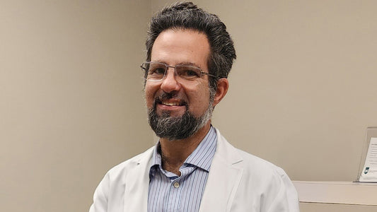 Physician meets with smiling patient