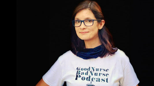 Photo of woman wearing glasses smiling at camera