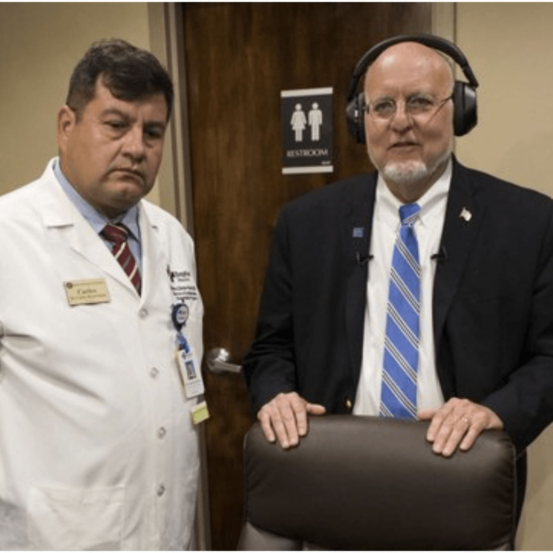 Telemedicine doctors standing with headphones on