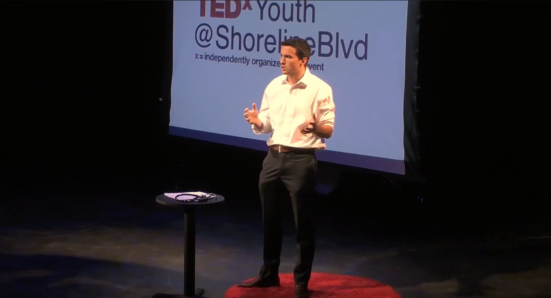 Connor Landgraf presenting TED talk