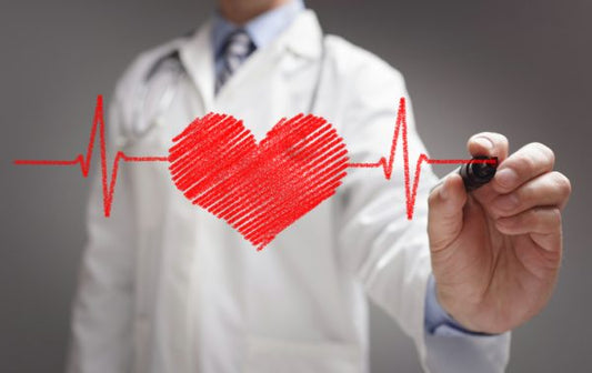 Clinician draws heart on markerboard